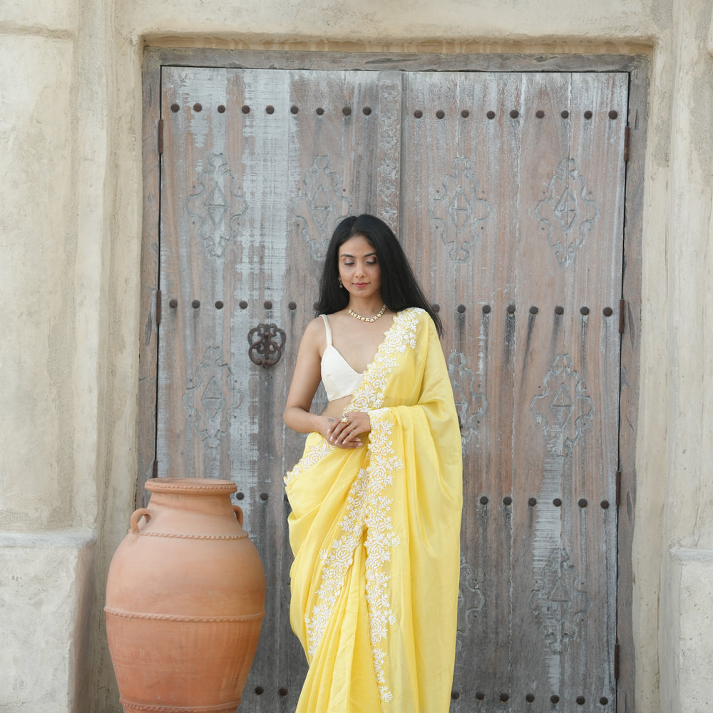 
                      
                        Menka Saree Set
                      
                    