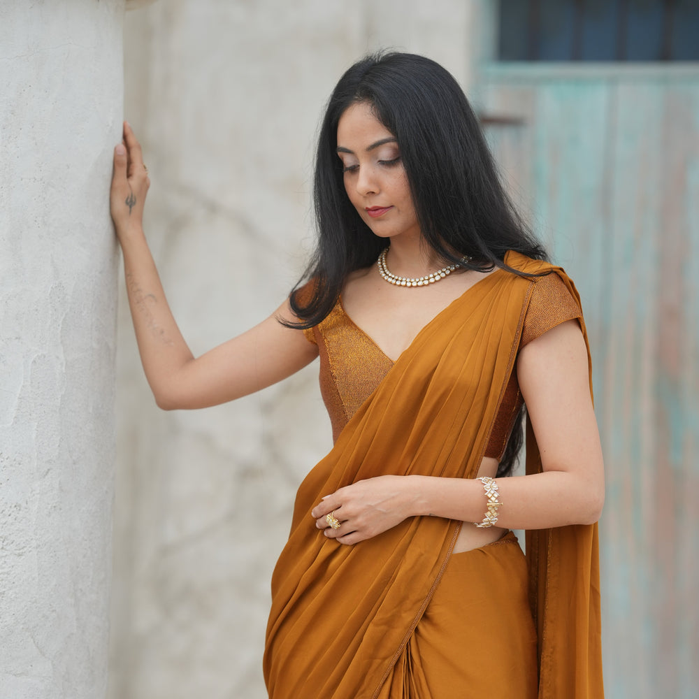 
                      
                        Ruhani Saree Set
                      
                    